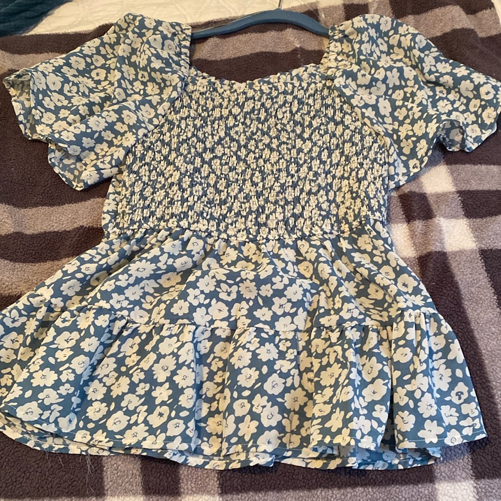 Blue and white flowery blouse